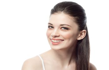 smiling young woman with perfect skin